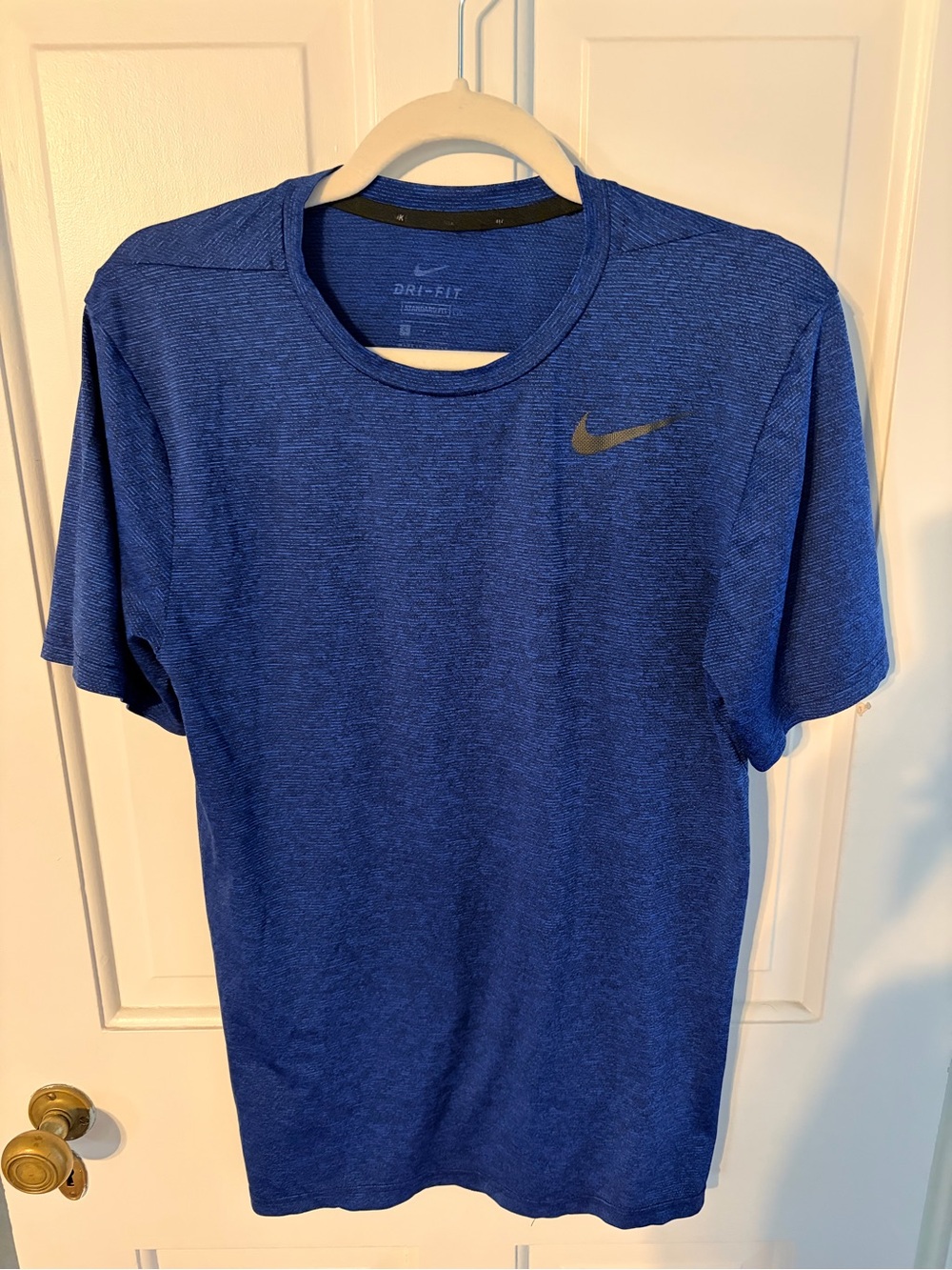 Nike Men's Short-Sleeve Dri-FIT Tee in Royal Blue with Black Swoosh